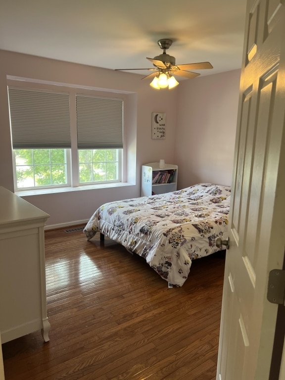 7 Ivy Ct, South Elgin, IL 60177 - bedroom featuring dark wood-style floors and ceiling fan