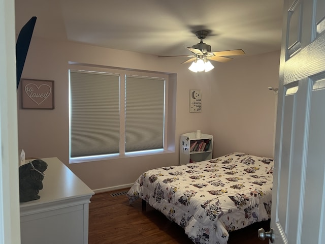 7 Ivy Ct, South Elgin, IL 60177 - bedroom with dark wood-style floors and ceiling fan