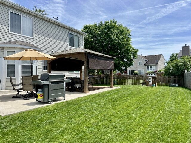 7 Ivy Ct, South Elgin, IL 60177 - fenced backyard with a patio and a gazebo