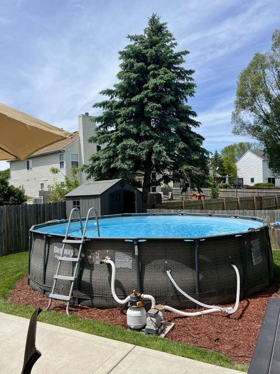 7 Ivy Ct, South Elgin, IL 60177 - view of swimming pool with a shed