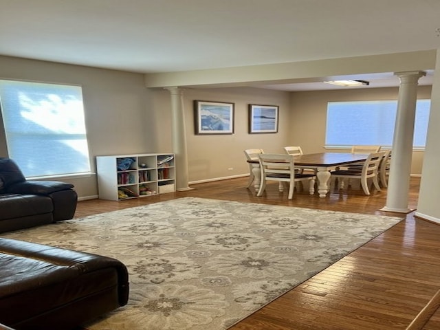 7 Ivy Ct, South Elgin, IL 60177 - living room with ornate columns and wood finished floors