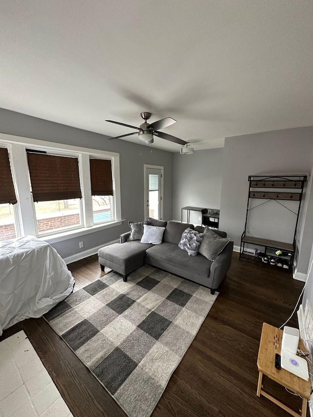 2009 W Garfield Blvd, Chicago, IL 60636 - living area with a ceiling fan, wood finished floors, and baseboards