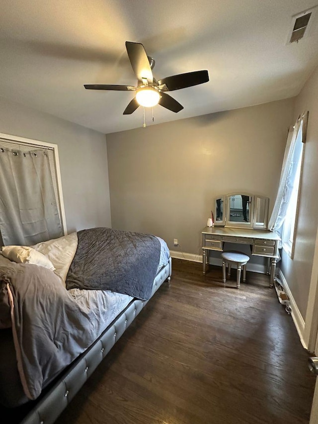 2009 W Garfield Blvd, Chicago, IL 60636 - bedroom with dark wood finished floors, baseboards, and a ceiling fan