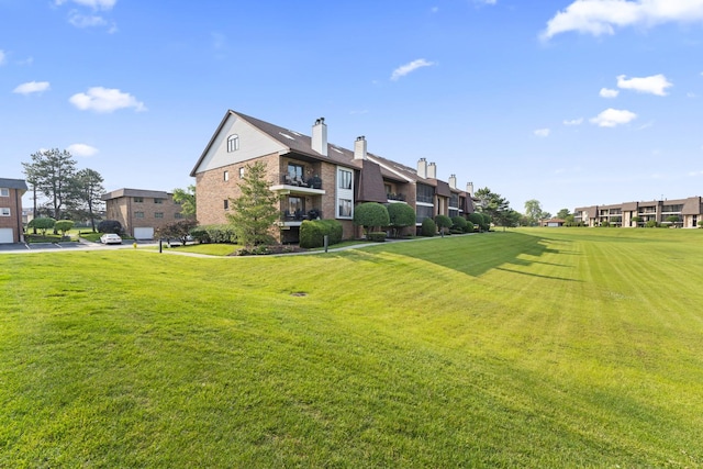 15715 Deerfield Ct Unit 1S, Orland Park, IL 60462 - view of grassy yard featuring a residential view