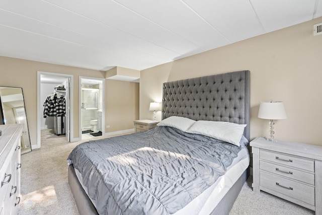 15715 Deerfield Ct Unit 1S, Orland Park, IL 60462 - bedroom featuring light colored carpet, a spacious closet, ensuite bath, and a closet
