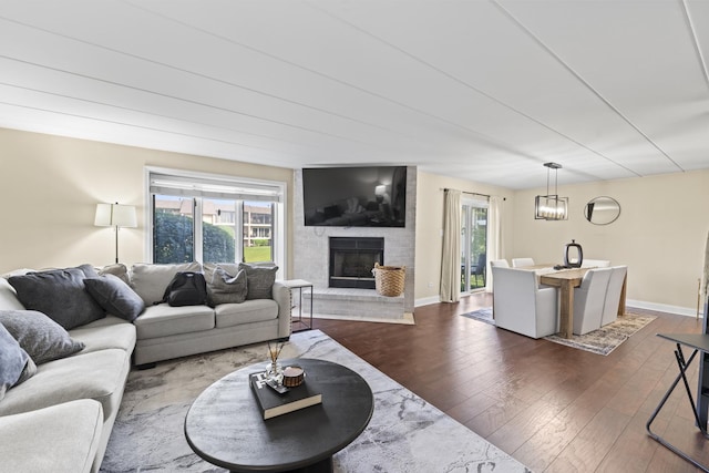 15715 Deerfield Ct Unit 1S, Orland Park, IL 60462 - living room with dark wood finished floors, plenty of natural light, and a fireplace
