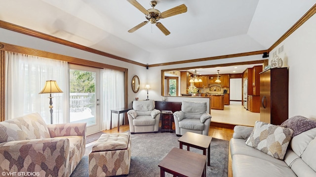 4445 Brittany Dr, Lisle, IL 60532 - living area with light wood-style floors, a ceiling fan, and a chandelier