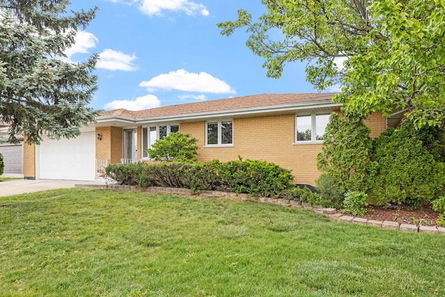 8862 167th St, Orland Hills, IL 60487 - ranch-style home with an attached garage, brick siding, driveway, and a front yard