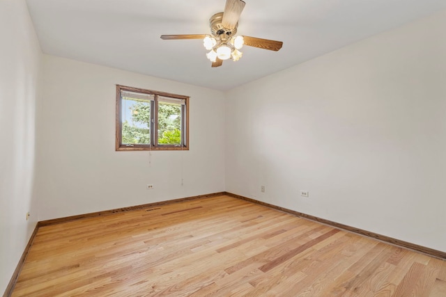 8862 167th St, Orland Hills, IL 60487 - empty room featuring light wood-style flooring, baseboards, and ceiling fan