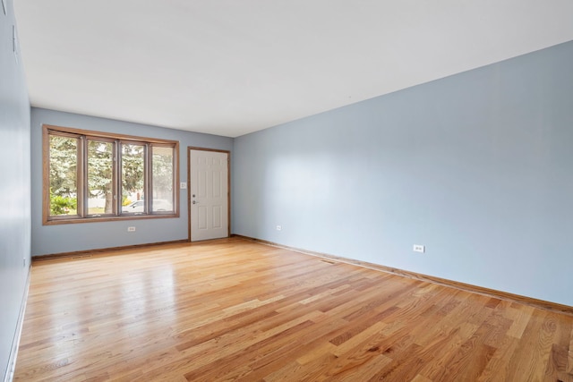 8862 167th St, Orland Hills, IL 60487 - empty room with light wood-style flooring and baseboards