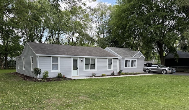 2407 Burbank St, Joliet, IL 60435 - single story home with a front lawn and roof with shingles