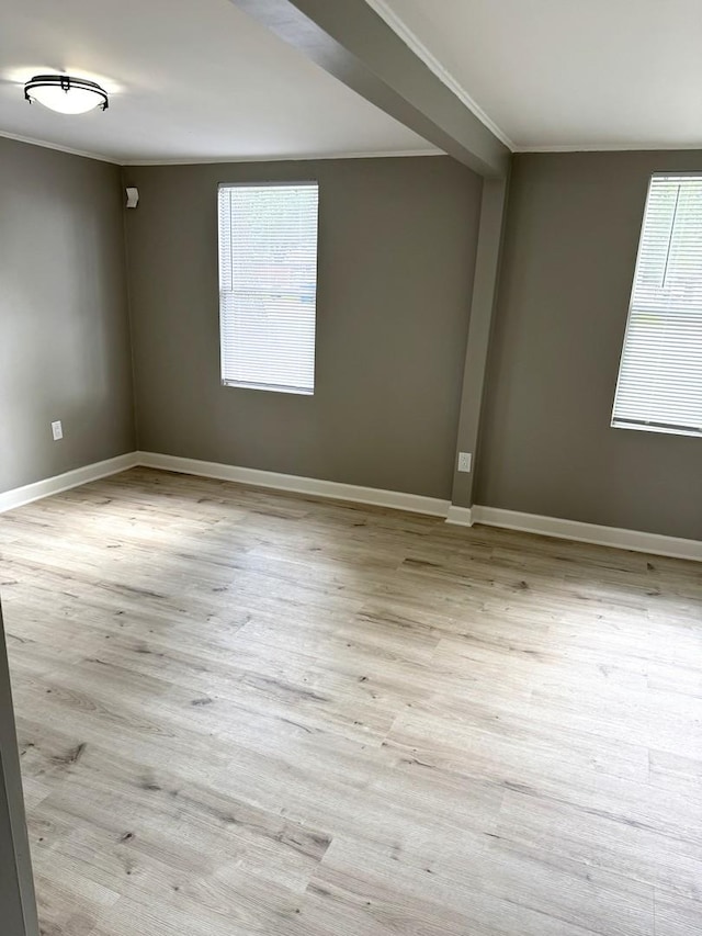 2407 Burbank St, Joliet, IL 60435 - unfurnished room featuring baseboards, wood finished floors, and crown molding