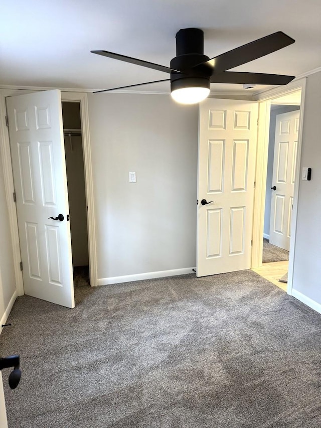 2407 Burbank St, Joliet, IL 60435 - unfurnished bedroom featuring carpet floors, baseboards, a ceiling fan, and a closet