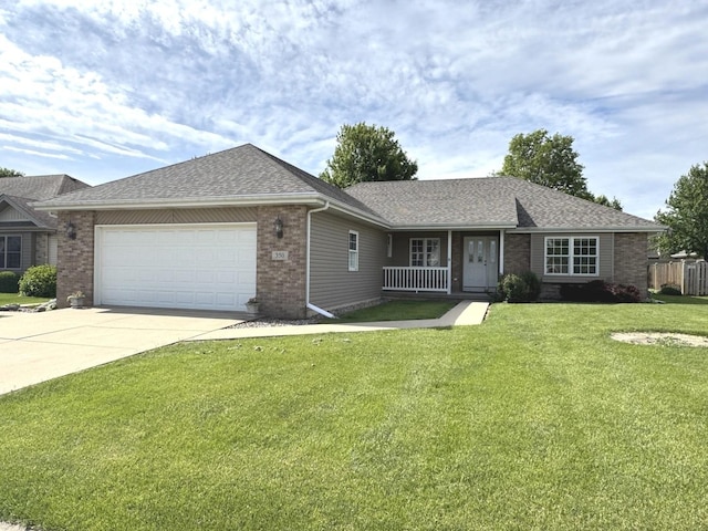 350 Centerpoint Dr N, Bourbonnais, IL 60914 - ranch-style home featuring brick siding, a garage, a front yard, concrete driveway, and a porch