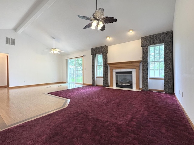 350 Centerpoint Dr N, Bourbonnais, IL 60914 - unfurnished living room with a ceiling fan, baseboards, a tiled fireplace, and carpet floors