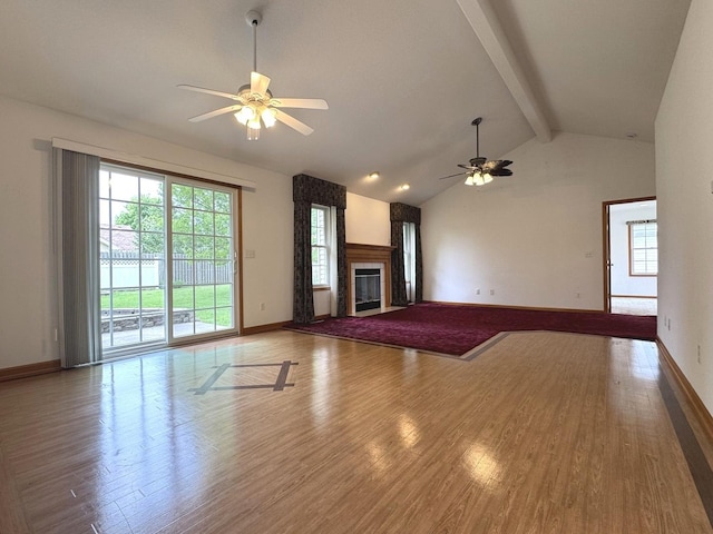 350 Centerpoint Dr N, Bourbonnais, IL 60914 - unfurnished living room with ceiling fan, wood finished floors, healthy amount of natural light, and baseboards