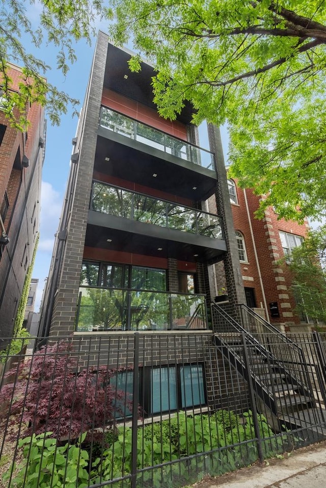 1110 N Marshfield Ave Unit 2, Chicago, IL 60622 - view of building exterior featuring stairway