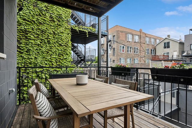 1110 N Marshfield Ave Unit 2, Chicago, IL 60622 - balcony featuring stairs and outdoor dining space