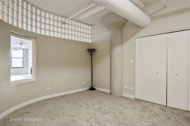 411 W Ontario St Unit 623, Chicago, IL 60654 - unfurnished bedroom with carpet floors, a closet, and baseboards