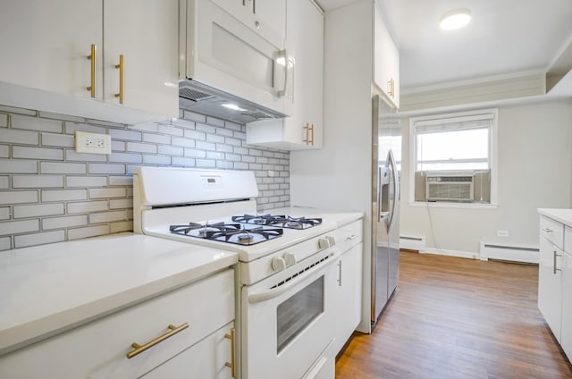 39 W Conti Pkwy Unit 2N, Elmwood Park, IL 60707 - kitchen with white appliances, a baseboard radiator, light countertops, tasteful backsplash, and crown molding