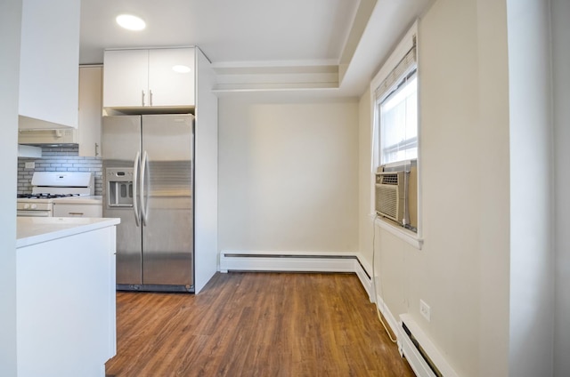 39 W Conti Pkwy Unit 2N, Elmwood Park, IL 60707 - kitchen featuring stainless steel fridge with ice dispenser, white gas range oven, baseboard heating, light countertops, and white cabinets
