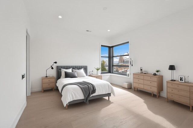 8833 Birch Ave, Morton Grove, IL 60053 - bedroom featuring baseboards, light wood-style floors, and recessed lighting