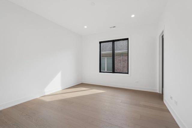 8833 Birch Ave, Morton Grove, IL 60053 - unfurnished room featuring wood finished floors, recessed lighting, and baseboards
