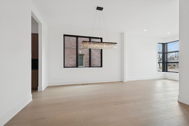 8833 Birch Ave, Morton Grove, IL 60053 - unfurnished dining area featuring light wood-type flooring, baseboards, and recessed lighting