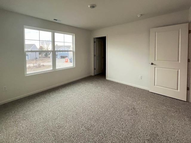 1025 Leeward Ln, Pingree Grove, IL 60140 - carpeted empty room with baseboards and a smoke detector