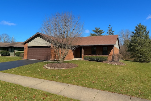 807 Violet Ln, Matteson, IL 60443 - ranch-style home with covered porch, brick siding, an attached garage, and a front yard
