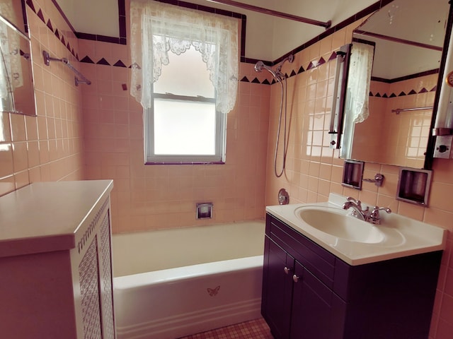 318 W 112th St, Chicago, IL 60628 - bathroom featuring tile walls, shower / bathtub combination, and vanity