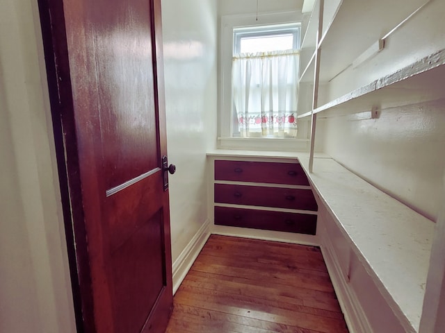 318 W 112th St, Chicago, IL 60628 - staircase with wood-type flooring and baseboards