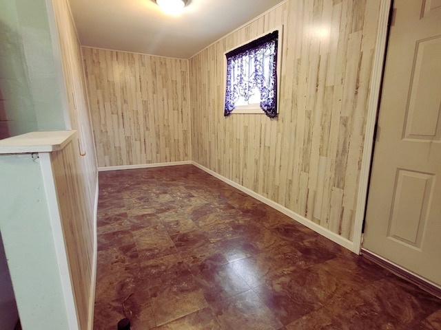 318 W 112th St, Chicago, IL 60628 - unfurnished room featuring wooden walls and tile patterned floors
