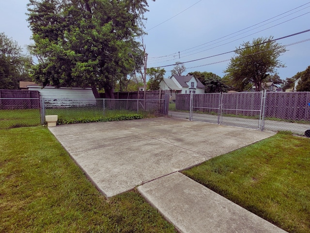318 W 112th St, Chicago, IL 60628 - view of yard featuring a gate