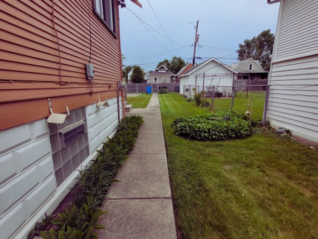 318 W 112th St, Chicago, IL 60628 - view of yard featuring a residential view