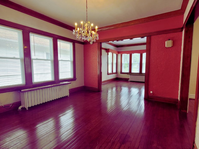318 W 112th St, Chicago, IL 60628 - empty room featuring radiator, dark wood-style flooring, a chandelier, ornamental molding, and a textured wall