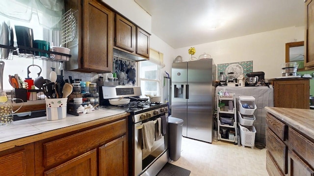 213 Arcadia Dr, Champaign, IL 61820 - kitchen featuring stainless steel appliances and light countertops
