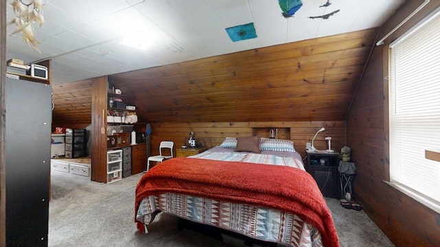 213 Arcadia Dr, Champaign, IL 61820 - bedroom with carpet floors, lofted ceiling, and wooden walls