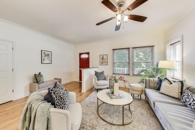 2430 Hastings Ave, Evanston, IL 60201 - living area with ornamental molding, light wood finished floors, and a ceiling fan
