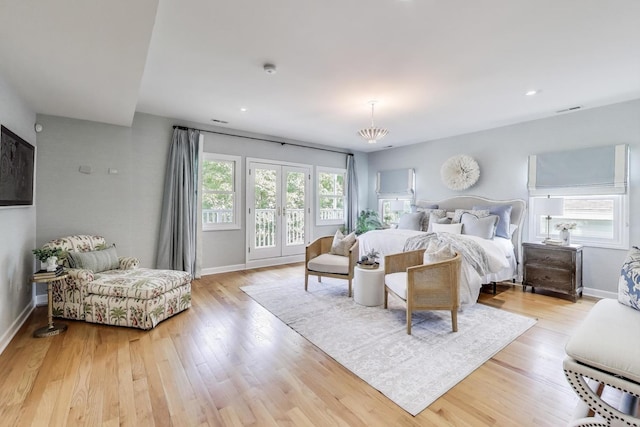 2430 Hastings Ave, Evanston, IL 60201 - bedroom featuring access to outside, light wood-style flooring, and recessed lighting