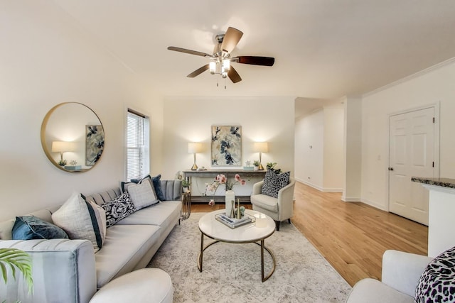 2430 Hastings Ave, Evanston, IL 60201 - living area featuring ceiling fan, light wood-type flooring, and ornamental molding