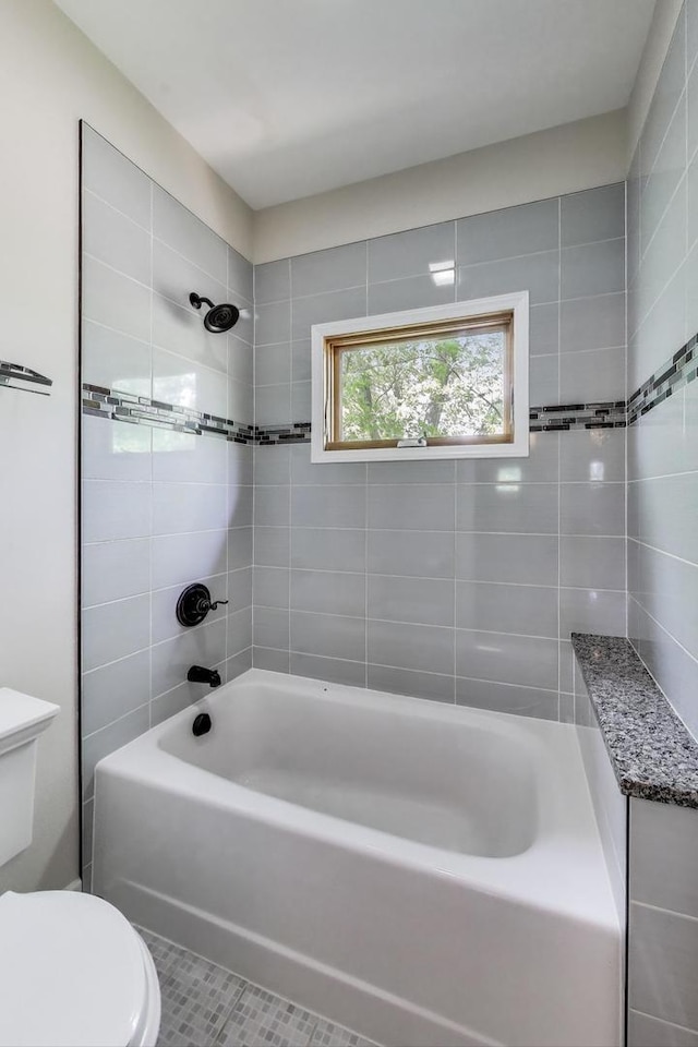 2430 Hastings Ave, Evanston, IL 60201 - bathroom with shower / bath combination and tile patterned flooring