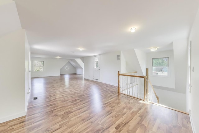 2430 Hastings Ave, Evanston, IL 60201 - unfurnished living room featuring light wood-style flooring and baseboards