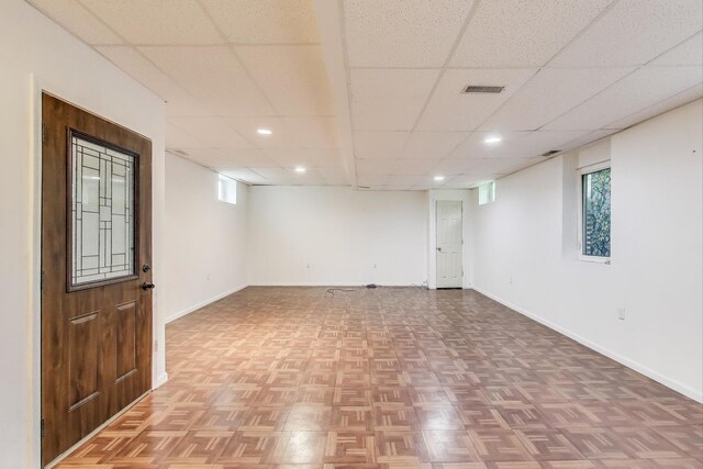2430 Hastings Ave, Evanston, IL 60201 - empty room with healthy amount of natural light, recessed lighting, and a drop ceiling