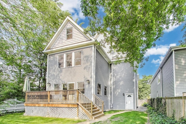 2430 Hastings Ave, Evanston, IL 60201 - rear view of house with a wooden deck