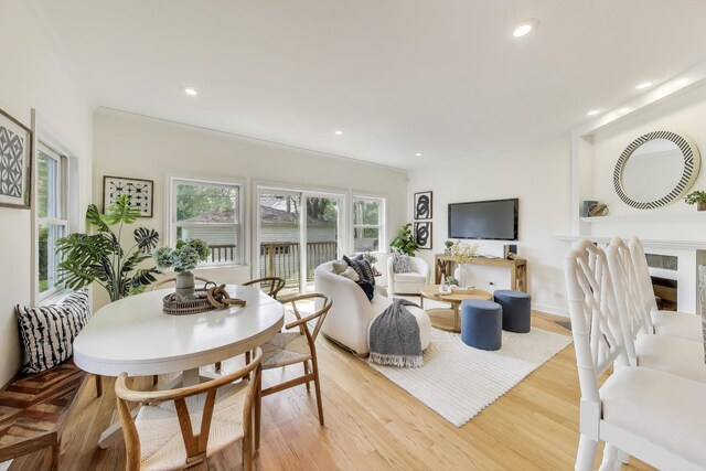 2430 Hastings Ave, Evanston, IL 60201 - dining space with light wood-style floors, recessed lighting, and crown molding