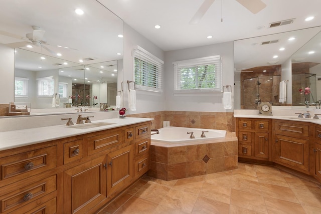 218 Delnor Ave, Saint Charles, IL 60174 - full bath with a ceiling fan, a stall shower, two vanities, a garden tub, and recessed lighting