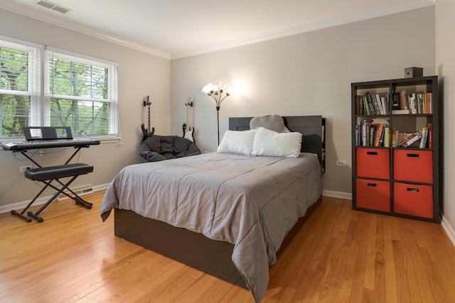 218 Delnor Ave, Saint Charles, IL 60174 - bedroom with light wood finished floors, ornamental molding, and baseboards