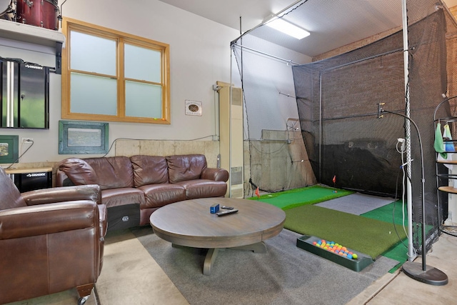 218 Delnor Ave, Saint Charles, IL 60174 - game room featuring concrete floors and golf simulator