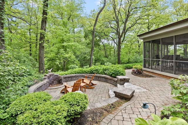 218 Delnor Ave, Saint Charles, IL 60174 - view of patio with a sunroom and a fire pit